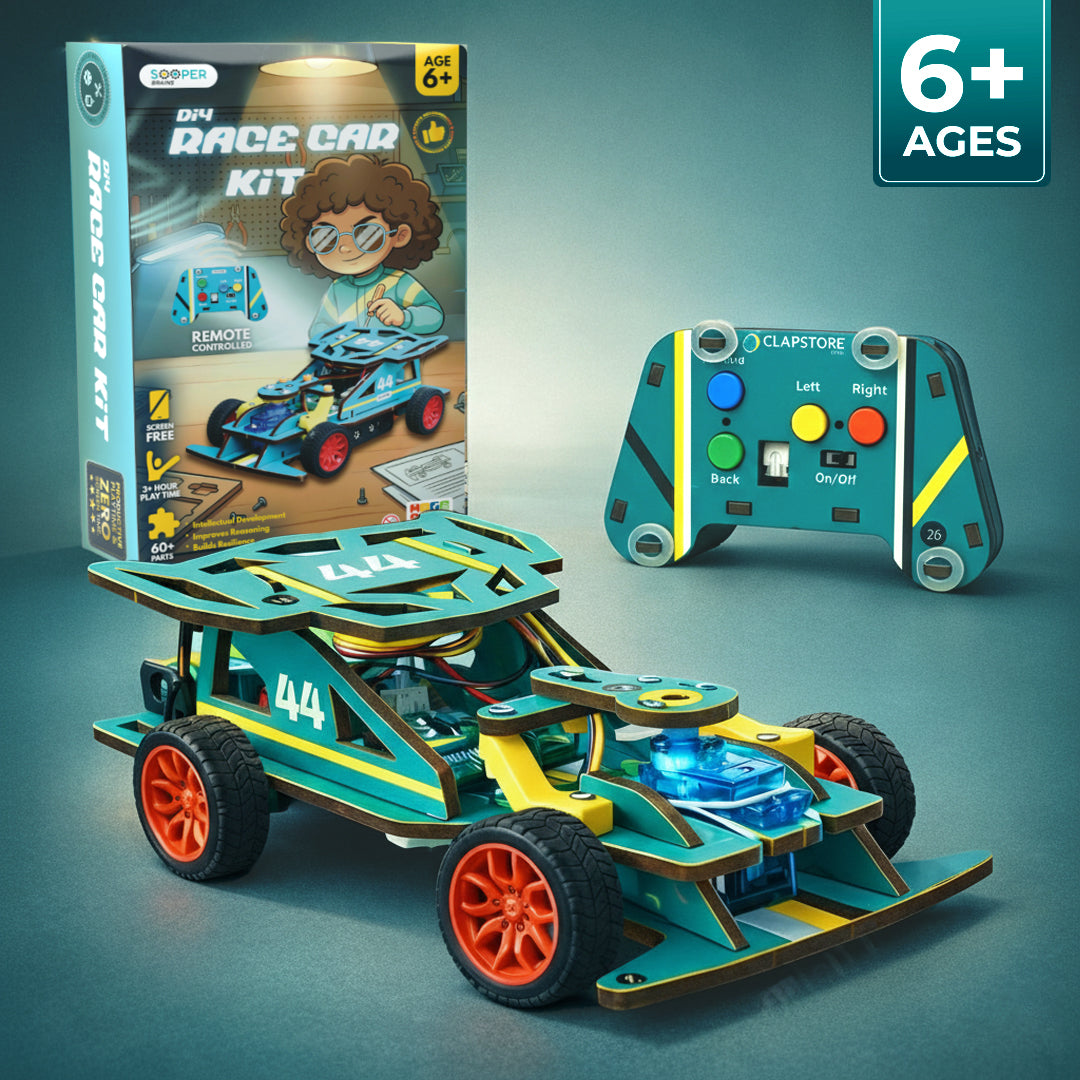 Toy race car kit with remote control and packaging on a teal background