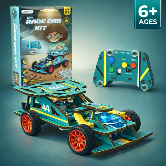 Toy race car kit with remote control and packaging on a teal background